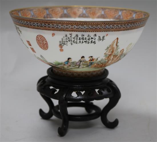 A Chinese egg shell porcelain bowl, wood stand and box